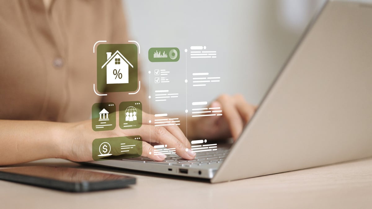 Homeowner reviewing property report and loan options on laptop — sell, refinance, or hold review near Penn State University
